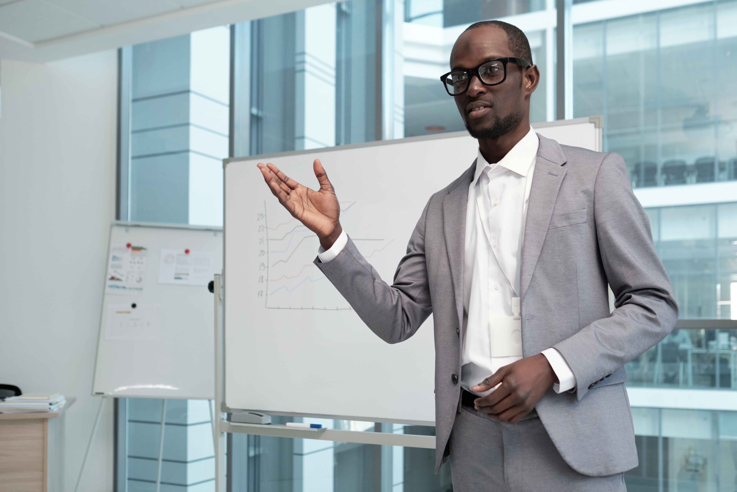 young-confident-male-teacher-explaining-audience-f-2023-11-27-05-10-38-utc (1)